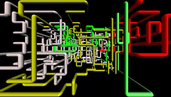 Colorful 3D pipes screensaver from the 2000s, featuring twisting red, green, and yellow pipes on a black background.