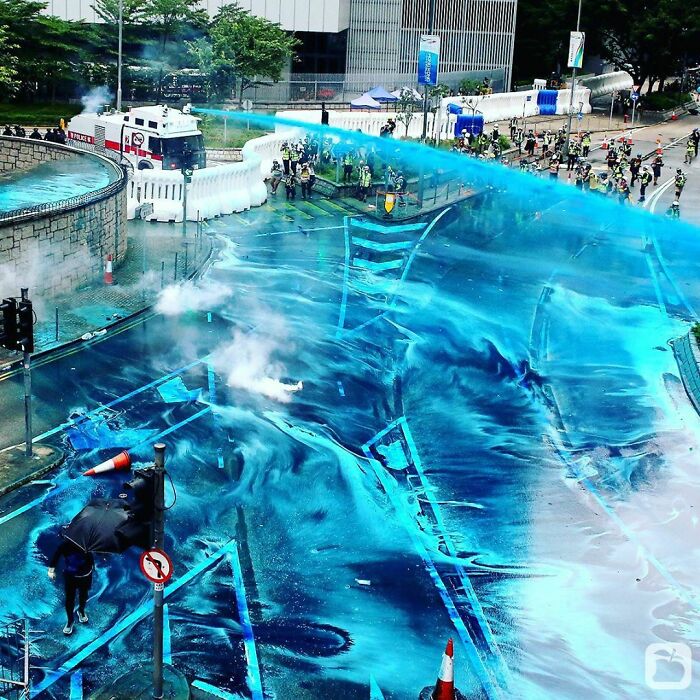 The Streets Of Hong Kong After Being Sprayed With A Blue Dye Water Cannon