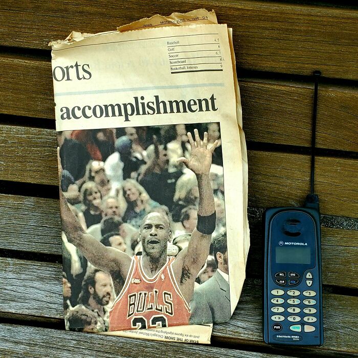 Found A Newspaper From 1998 And A Phone From The Same Era Left Alone On A Bench
