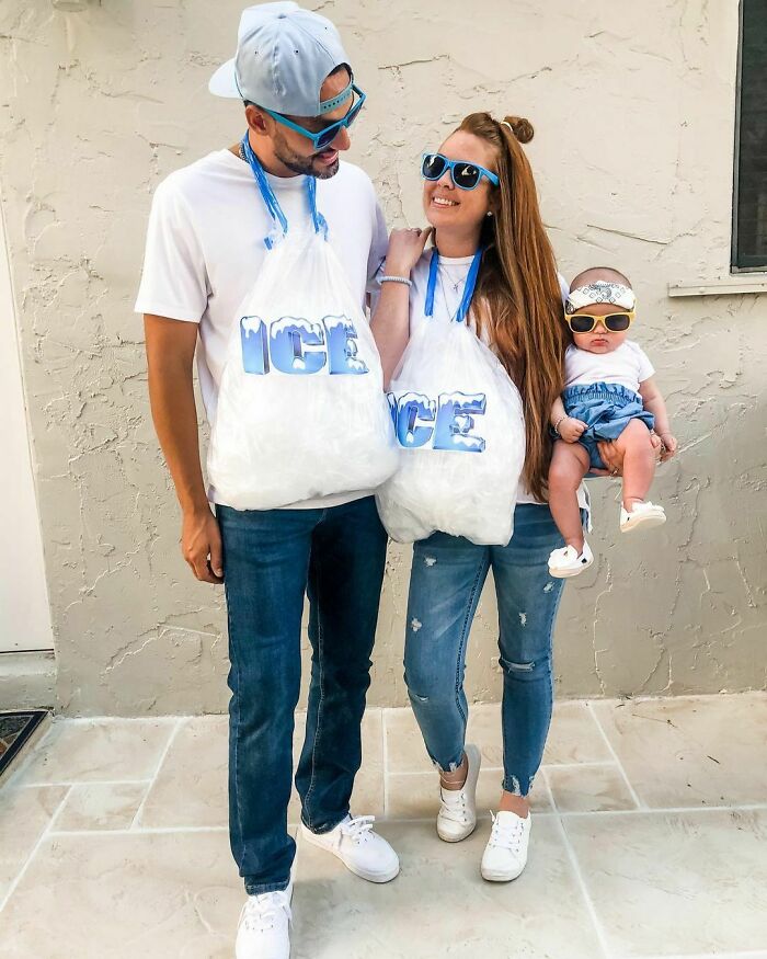 Couple and baby wearing simple Halloween costumes as ice bags, showcasing effortless costume ideas that turned out great.