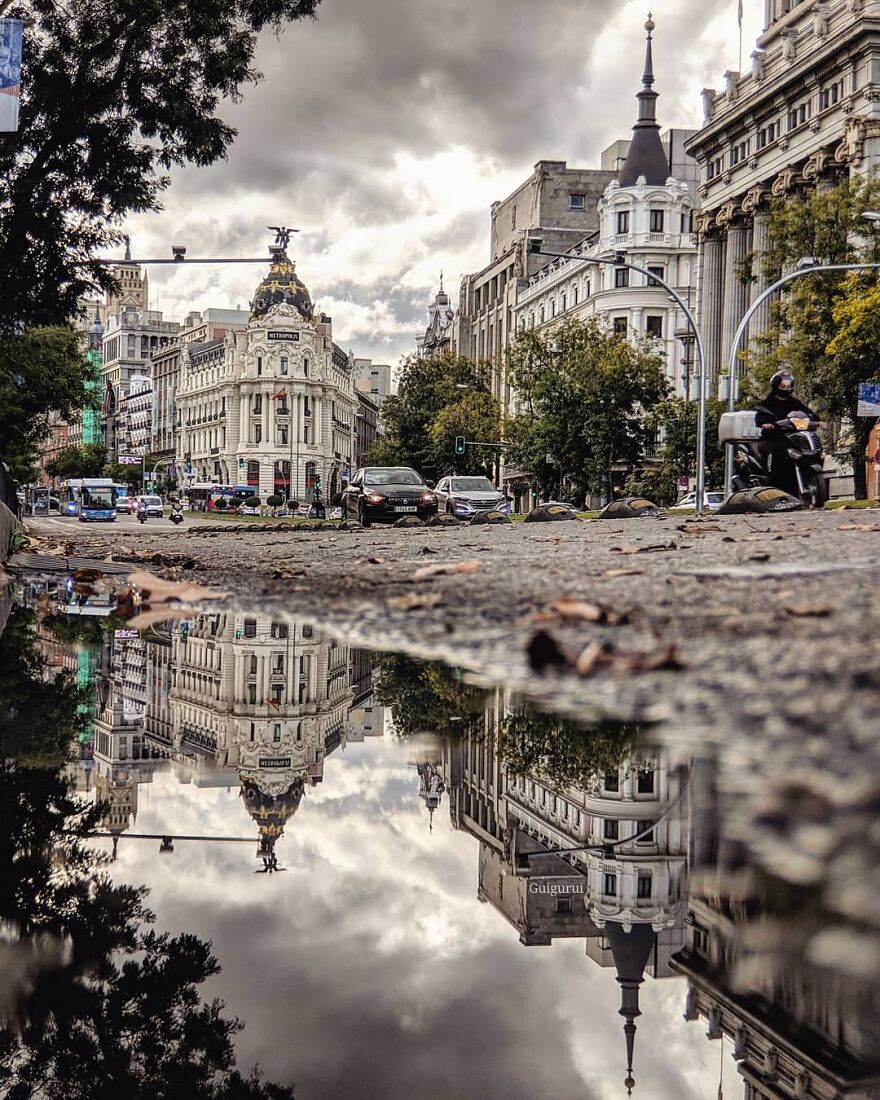Unusual Pictures Of The Beauty Of Madrid Through Reflections And Puddles