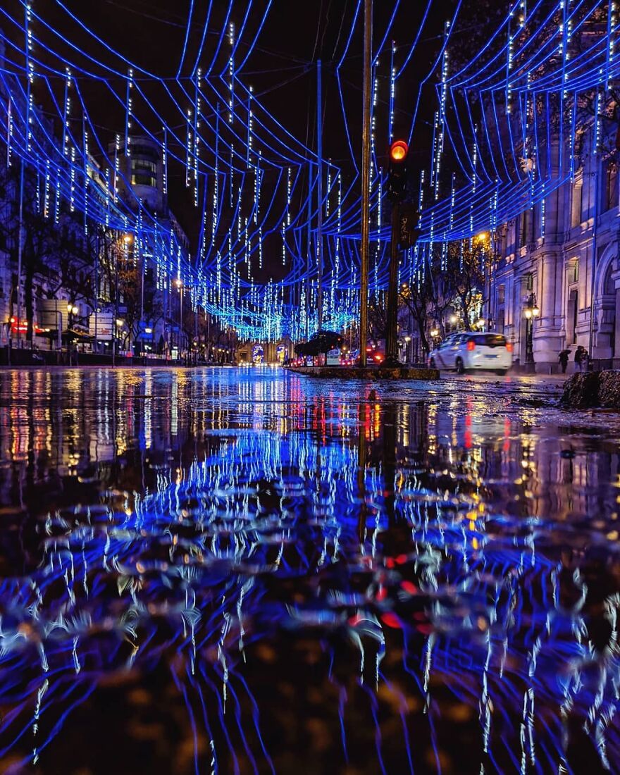 Unusual Pictures Of The Beauty Of Madrid Through Reflections And Puddles