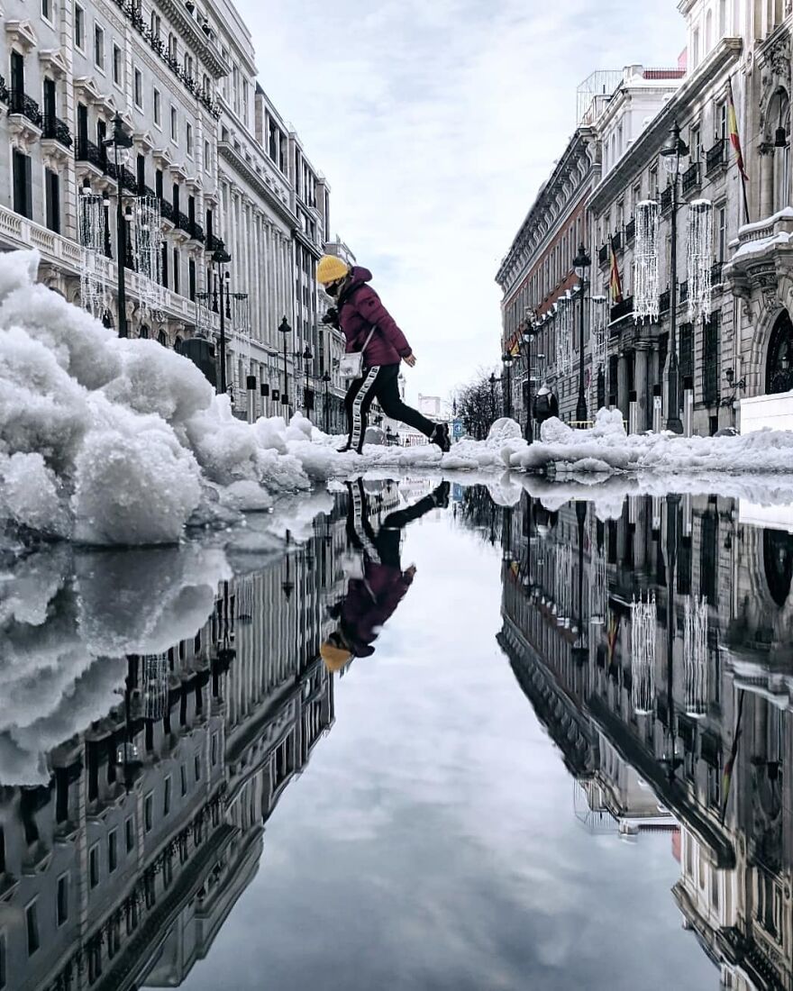 Unusual Pictures Of The Beauty Of Madrid Through Reflections And Puddles