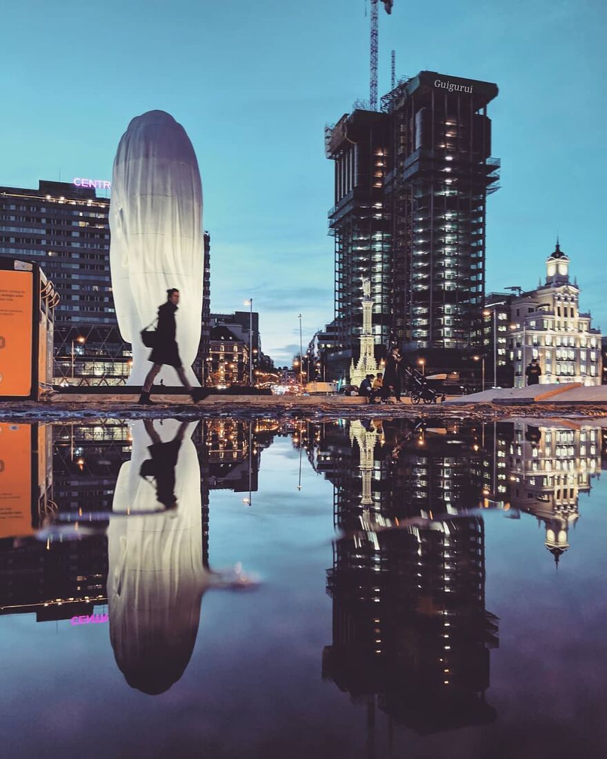 Unusual Pictures Of The Beauty Of Madrid Through Reflections And Puddles