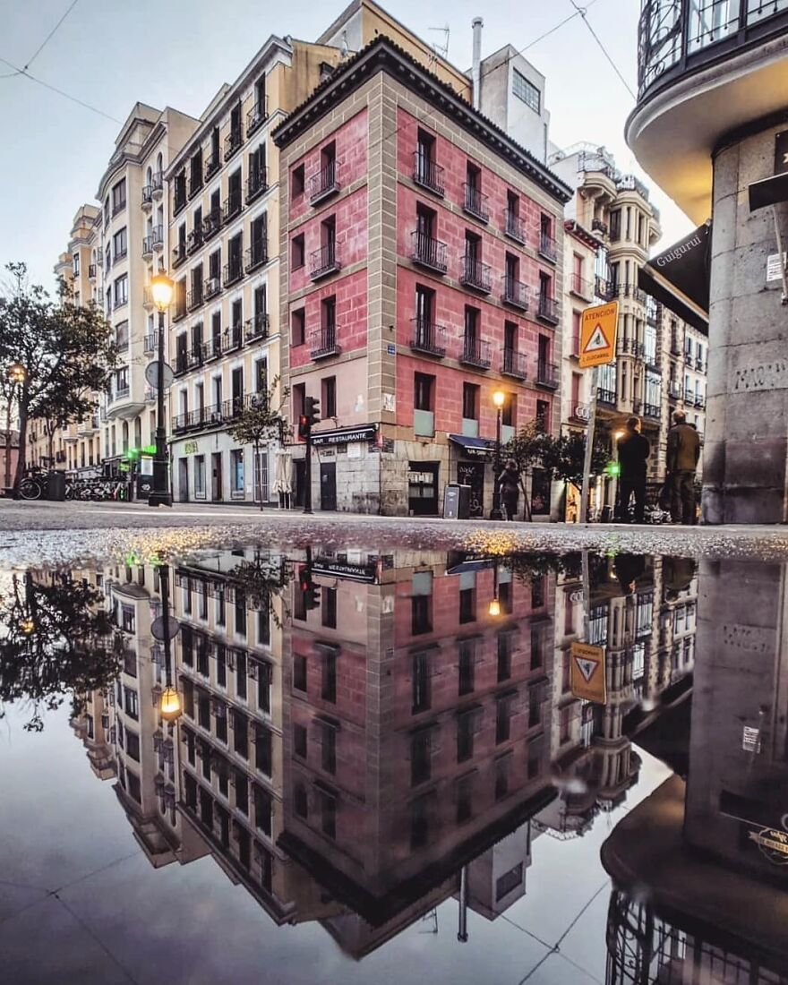 Unusual Pictures Of The Beauty Of Madrid Through Reflections And Puddles
