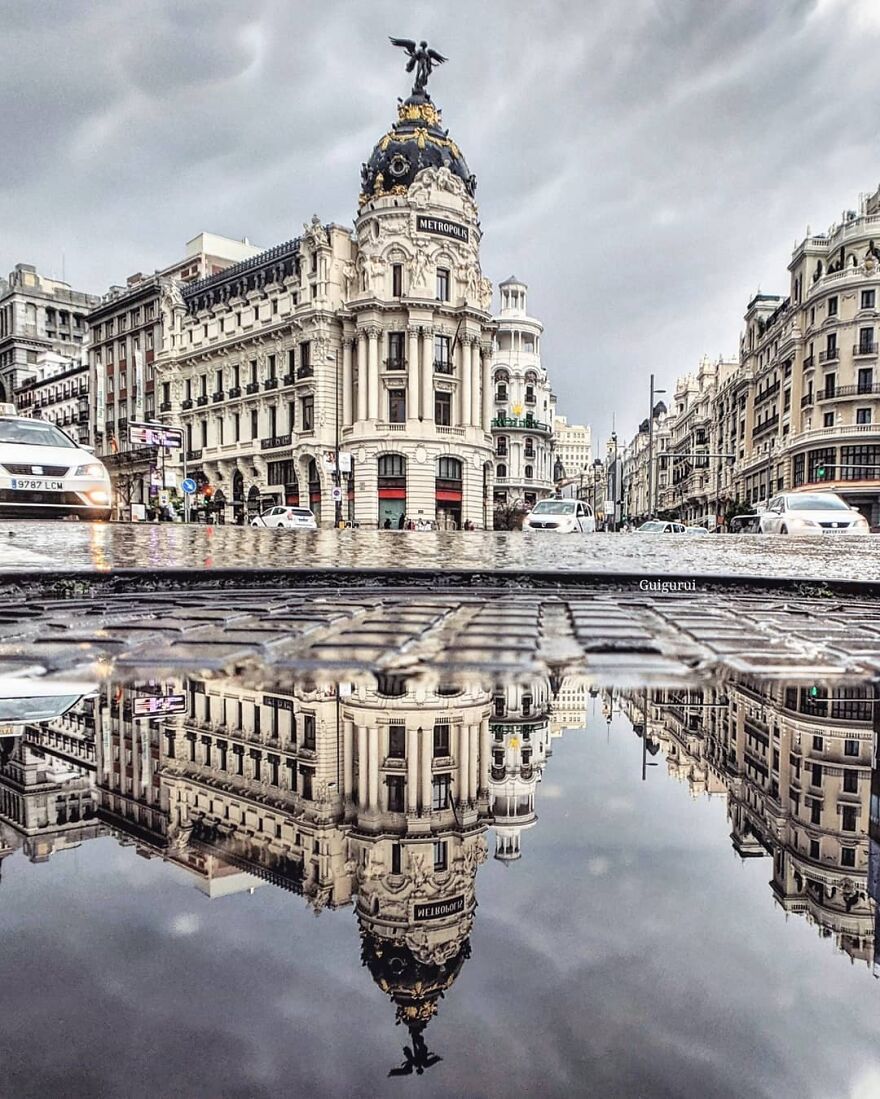 Unusual Pictures Of The Beauty Of Madrid Through Reflections And Puddles