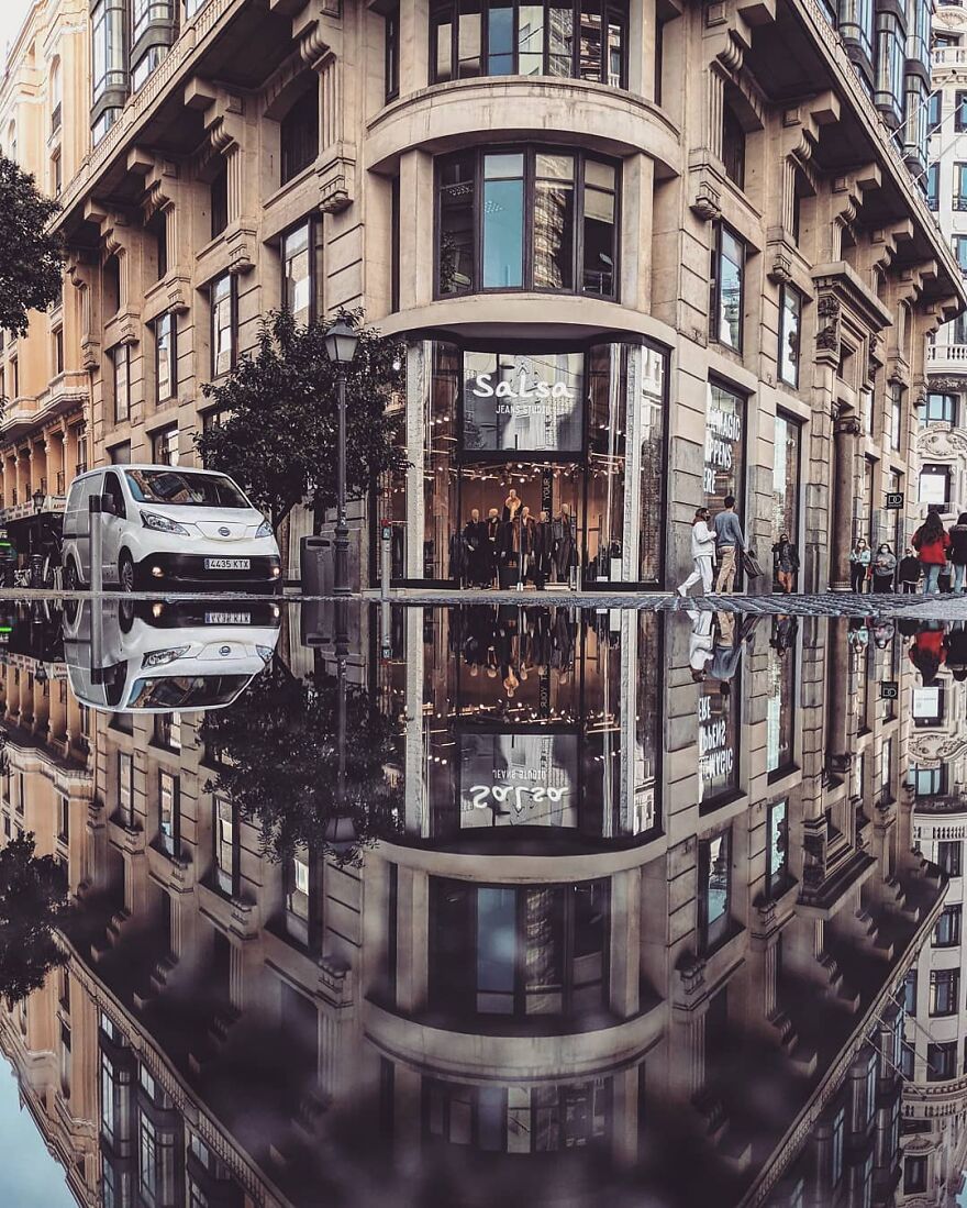 Unusual Pictures Of The Beauty Of Madrid Through Reflections And Puddles