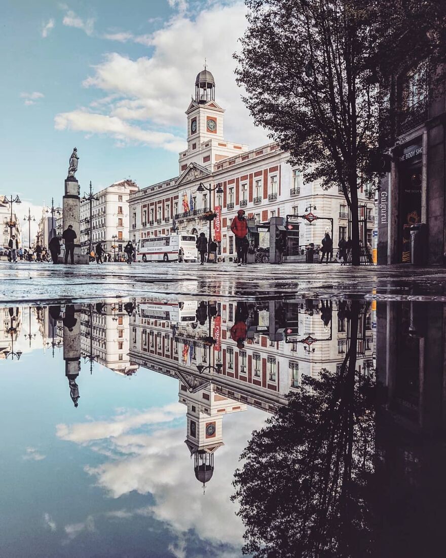 Unusual Pictures Of The Beauty Of Madrid Through Reflections And Puddles