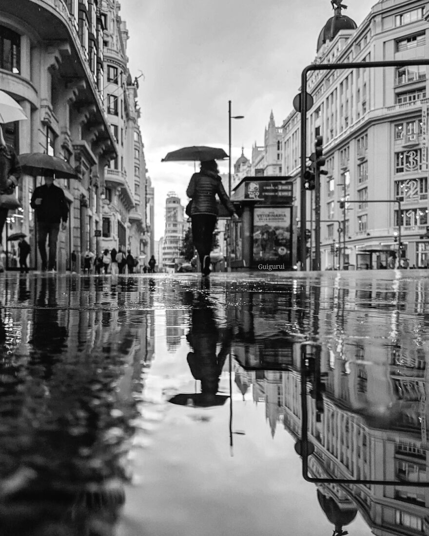 Unusual Pictures Of The Beauty Of Madrid Through Reflections And Puddles