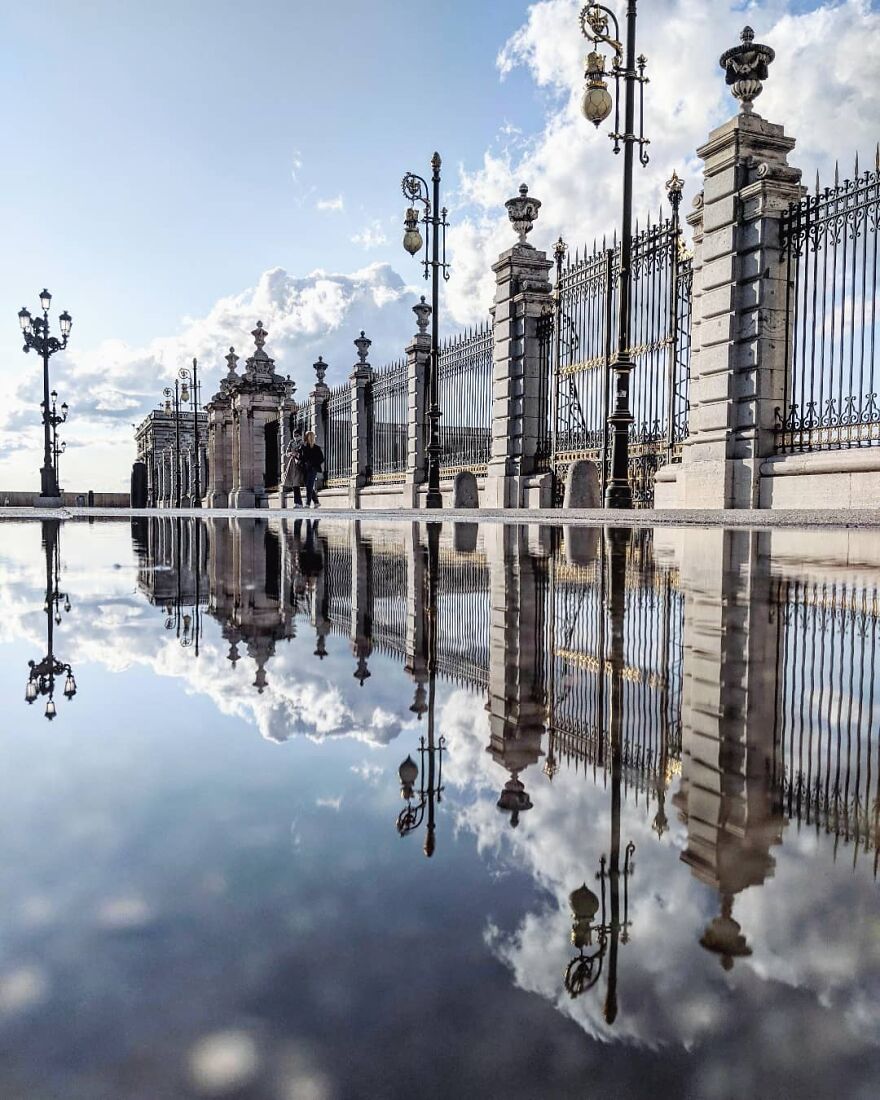 Unusual Pictures Of The Beauty Of Madrid Through Reflections And Puddles