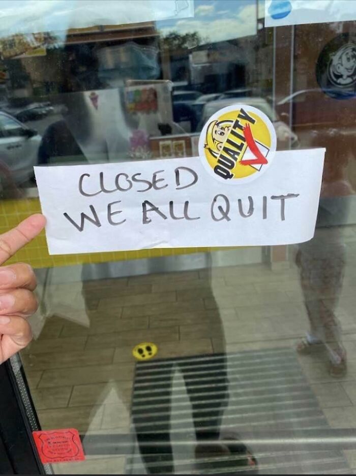 Sign on glass door reading closed we all quit, illustrating a boss from hell situation shared in a community post.