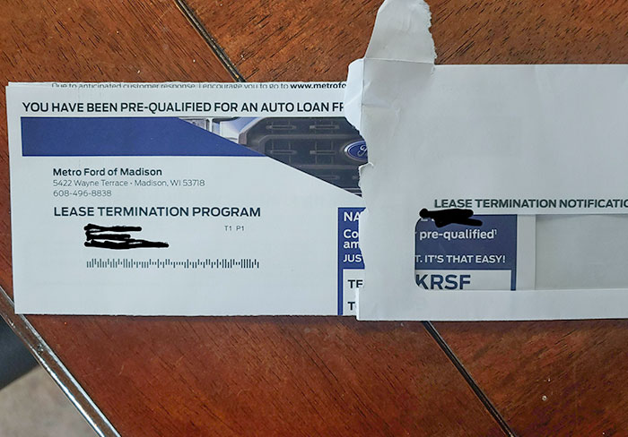 Partial mailer from car dealership promoting lease termination program, illustrating evil marketing techniques used by businesses.