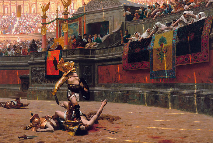 Gladiator fighting in ancient Roman arena with crowds watching, illustrating disturbing facts to ruin your day concept.
