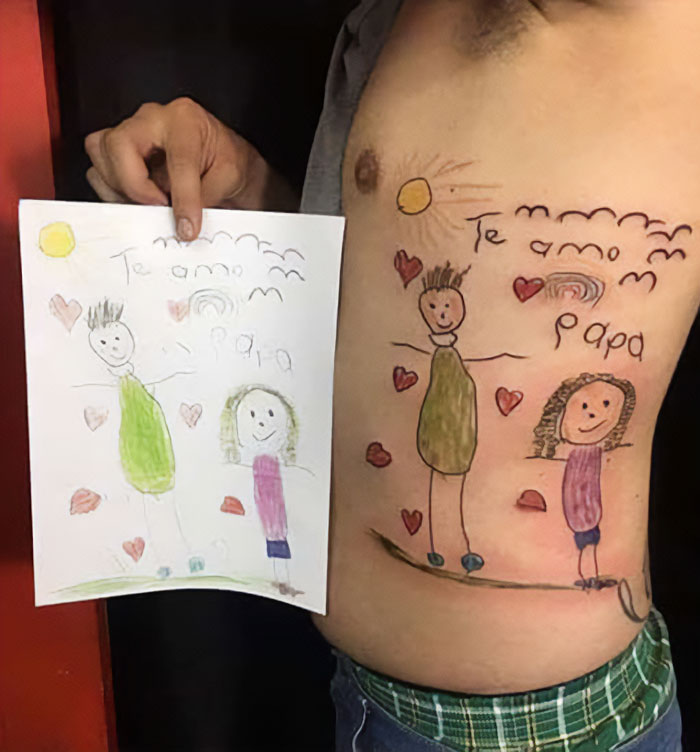 Child's drawing tattooed on a person's torso, depicting a colorful family scene.
