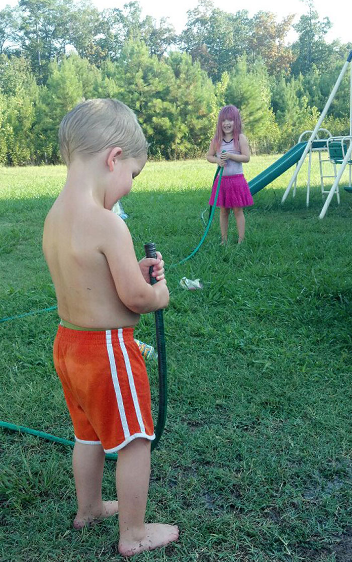 Daughter About To Unleash A Fun Prank On Her Little Brother