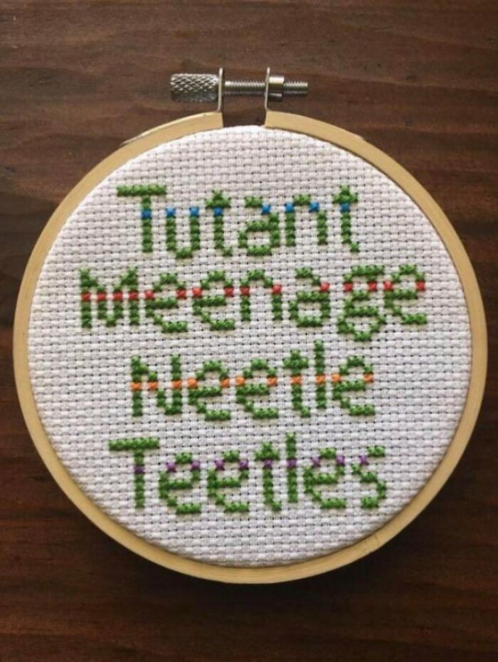 Cross-stitched text with jumbled words humorously illustrating a confusing train of thought, shared in an online group.