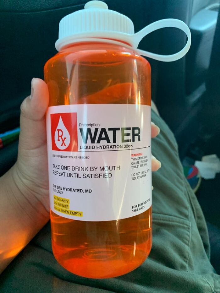 Hand holding a bottle labeled "Prescription Water," humorously mimicking a medication bottle, about drinking water.