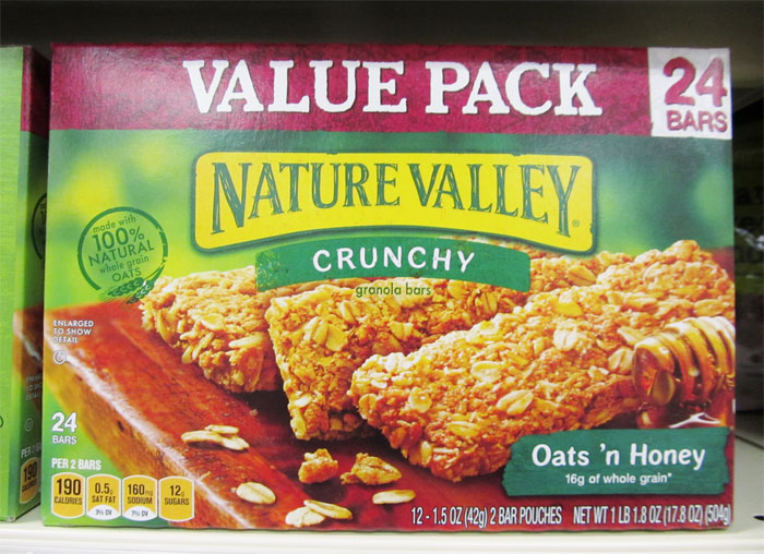 Nature Valley granola bars value pack with oats and honey, showcasing crunchy texture and natural ingredients.
