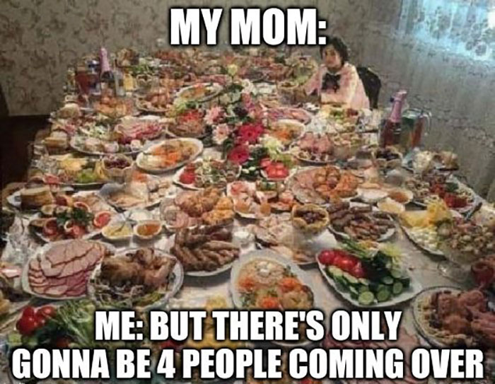 Thanksgiving meme showing a mom with a table overflowing with food, humorously highlighting excess preparation.