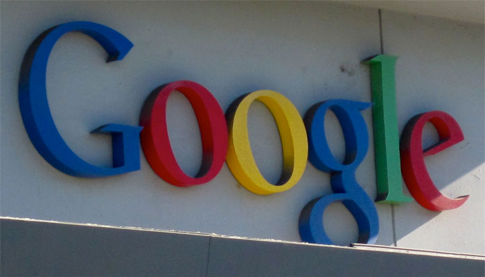 Google logo on building facade, illustrating sarcastically honest slogans about famous brands shared online.