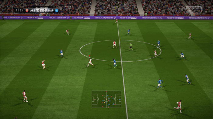 Soccer video game with Arsenal and Napoli teams playing in a virtual stadium showing gameplay and player positions.
