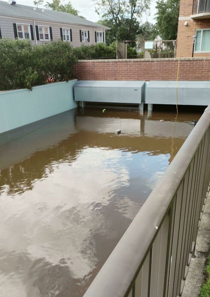This Flooded Parking Garage, Containing Roughly 150 Cars