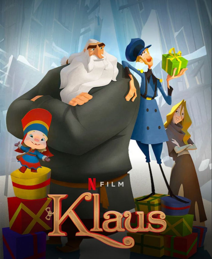 Animated characters from "Klaus," a Christmas movie featuring a friendly man with a white beard and a green gift box.