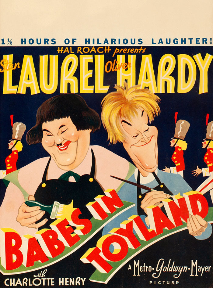 Poster of "Babes in Toyland" featuring Laurel and Hardy, a classic Christmas movie.