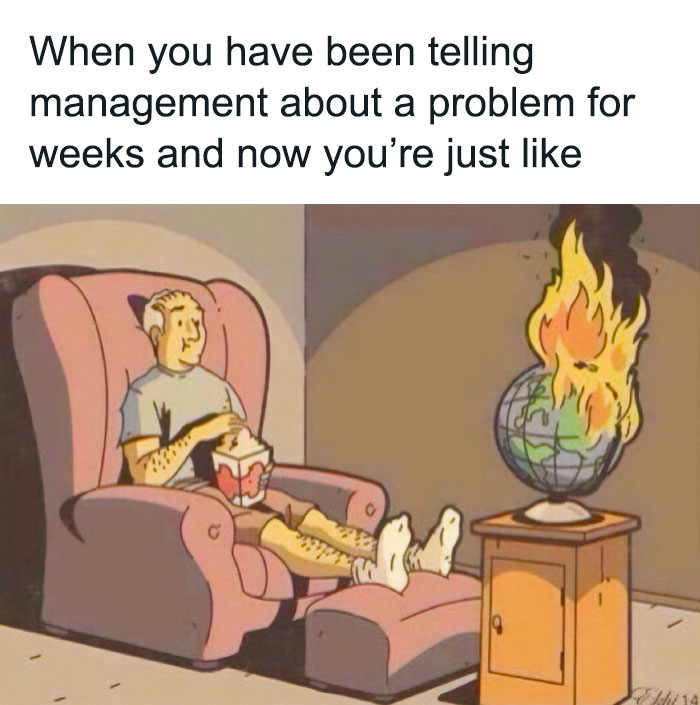 Man calmly eating popcorn while a globe burns nearby, illustrating frustration in work-related memes.