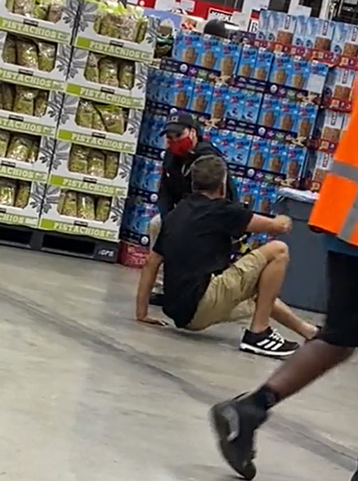 Anti-Masker Gets Roasted Online For Lying On Costco Floor For 8 Minutes To Protest Mask Requirements