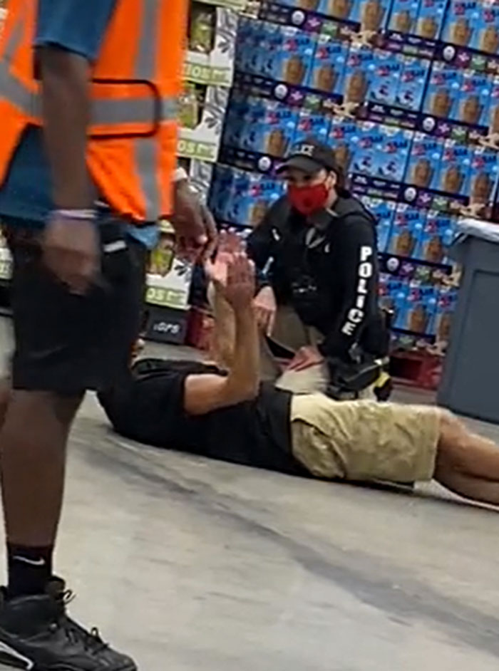 Anti-Masker Gets Roasted Online For Lying On Costco Floor For 8 Minutes To Protest Mask Requirements