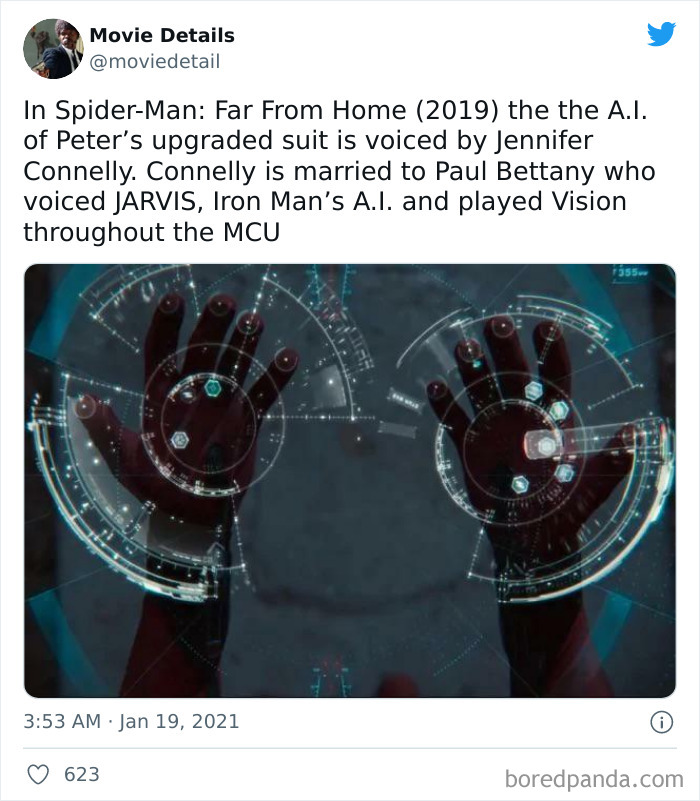 Hands with digital interface overlay visualizing Spider-Man suit features, illustrating obscure movie Easter eggs in Marvel films.