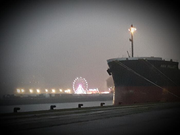 I Work On The Pot On Rouen, France And The Fun Fair Settled On The Other Bank Which LED To An Eerie, November-Evening Picture