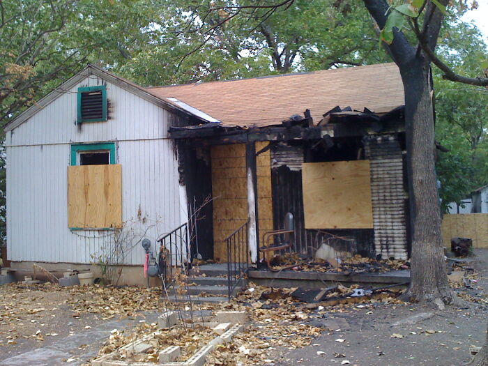 Burned and boarded-up house with fire damage, an example lawyers in this online group might share about big time mess-ups.