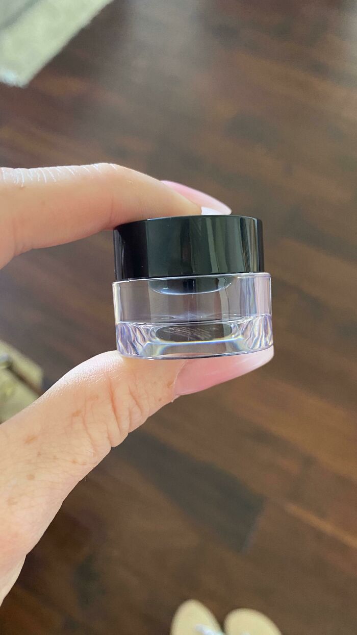 Tiny Little Amount Of Eyeliner In A Huge Plastic Container
