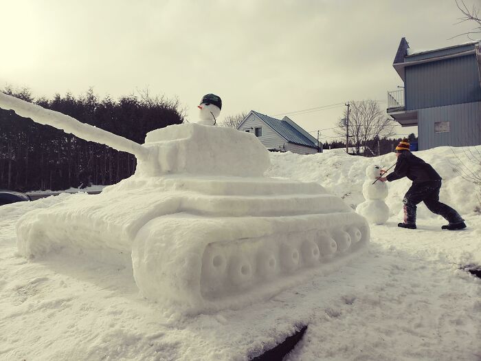 Me And My Family Carved This For A Snowman Contest. We Named It "The Abominable Snow Tank And Its Strangling Soldiers"