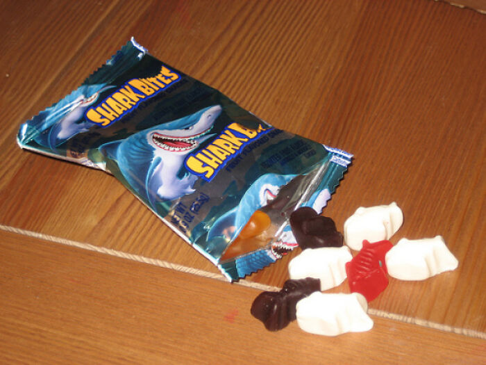 Packet of Shark Bites gummies on a table, capturing the essence of nostalgic 90s foods.