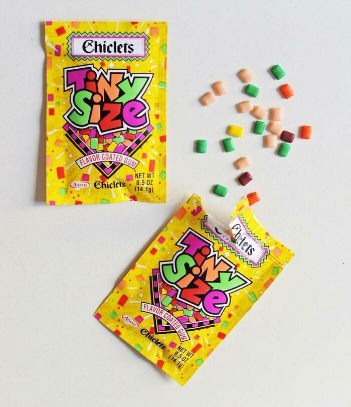 Tiny Size Chiclets candy-coated gum spilled from a nostalgic 90s yellow package.