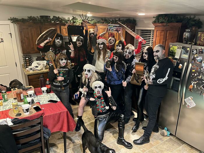 Showing Off The White Elephant Presents At A Black Christmas Party