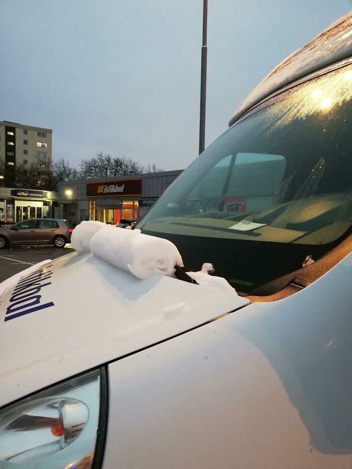 This Thin Snow Layer Folded Itself In To A Roll On A Windshield