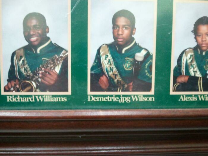 Three young band members in uniforms, highlighting a humorous example of unusual or dumb names encountered by parents.