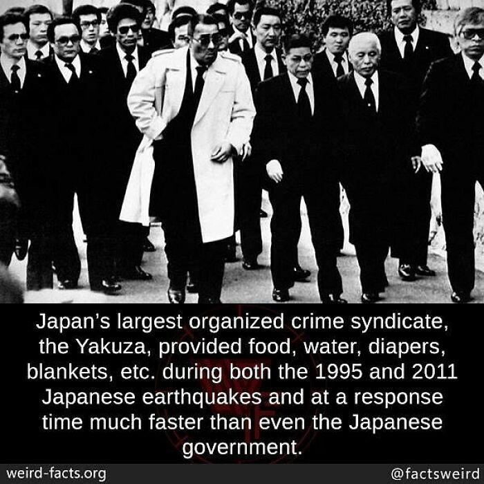 Group of men in suits and coats walking outdoors, illustrating weird facts about the world and unexpected humanitarian aid.