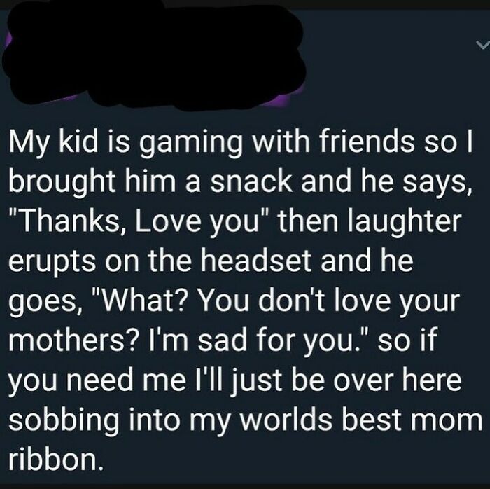 Heartwarming picture of a parent sharing a loving moment with their kid gaming with friends from wholesome internet posts.