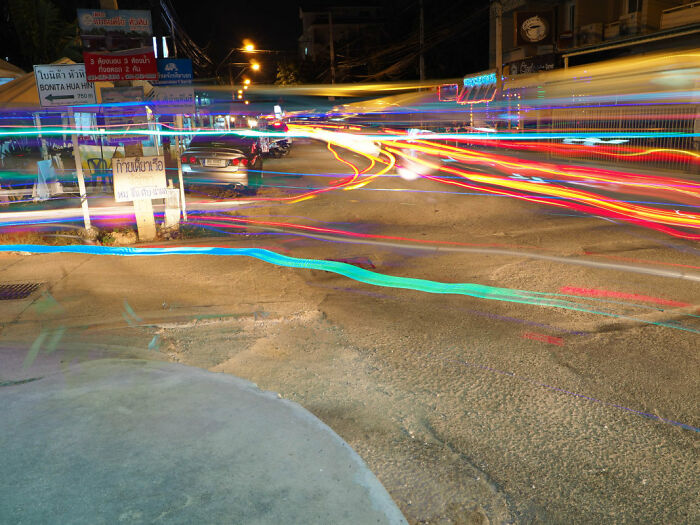 Down At The Corner - Motorbikes And Tuk-Tuks