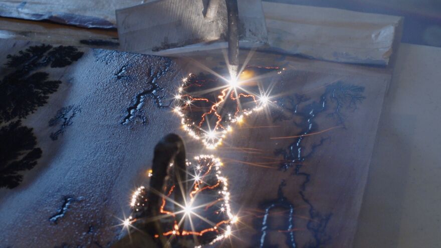 Capturing And Displaying The Beauty Of High Voltage Electricity Using A Homemade Lichenburg Machine.