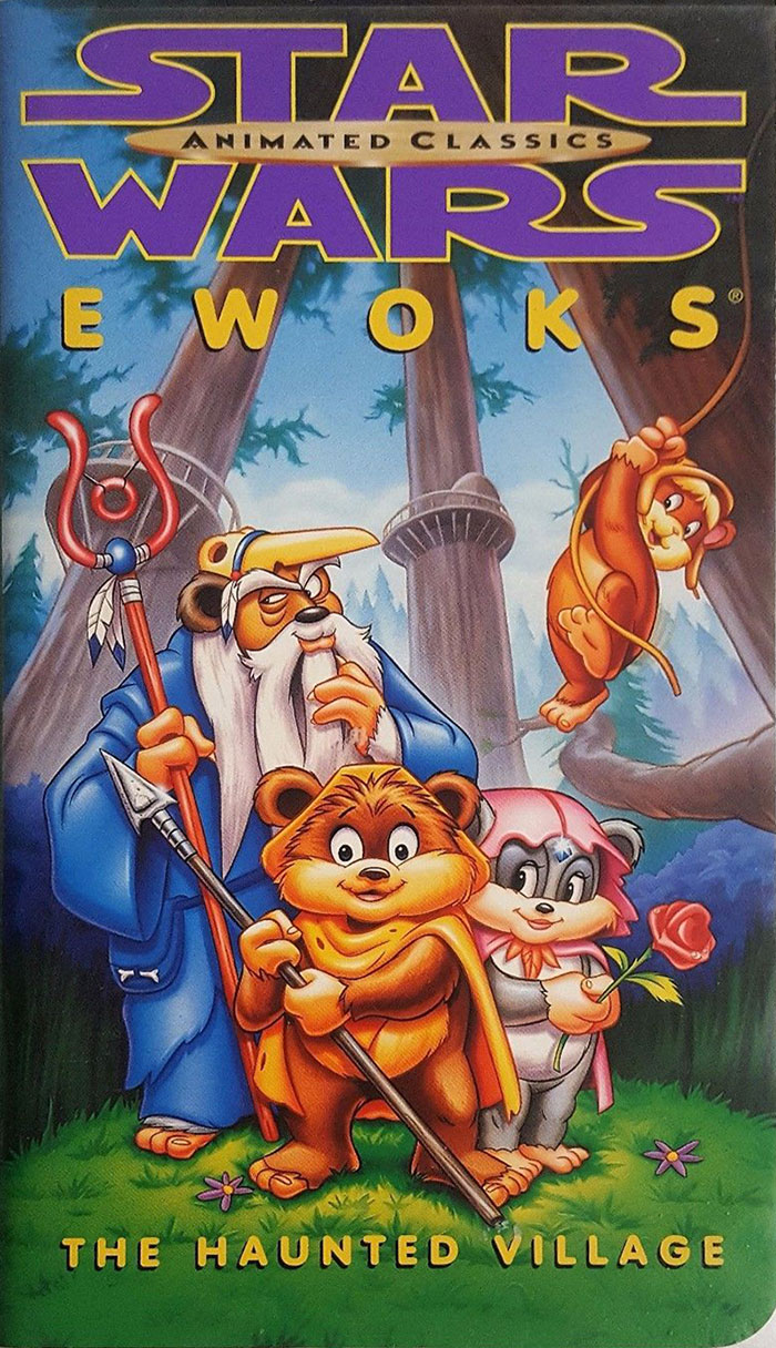 Star Wars Ewoks animated characters from 80s cartoons standing in a forest scene with trees and flowers.