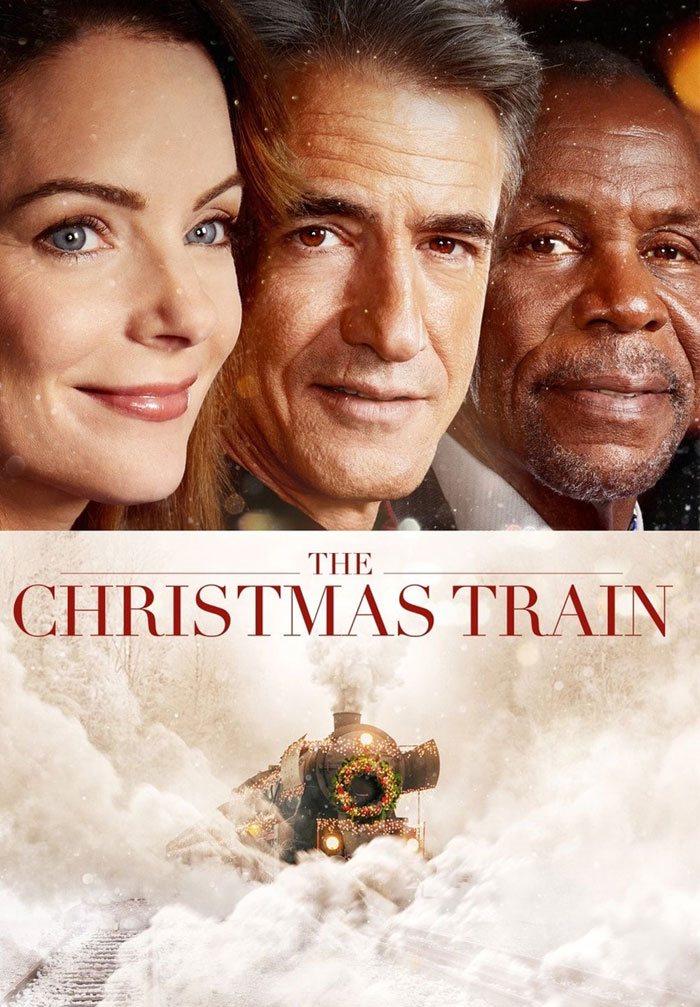 Poster of "The Christmas Train" featuring a festive train and three people, highlighting best Christmas movies to enjoy.