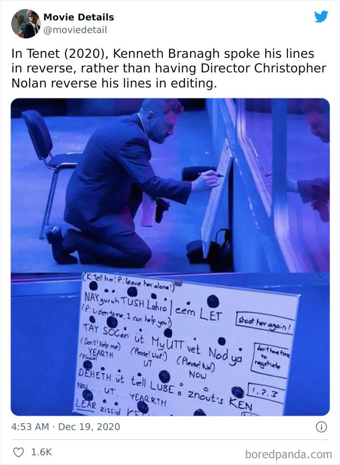 Actor kneeling and writing on a whiteboard in a movie scene highlighting obscure movie Easter eggs from Twitter.