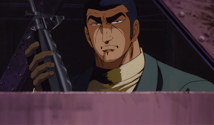 Duke Togo holding a rifle