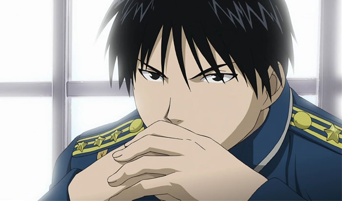 Roy Mustang wearing a police uniform 